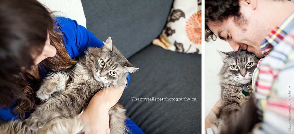 A woman cradles her cat and a man and his cat photo.