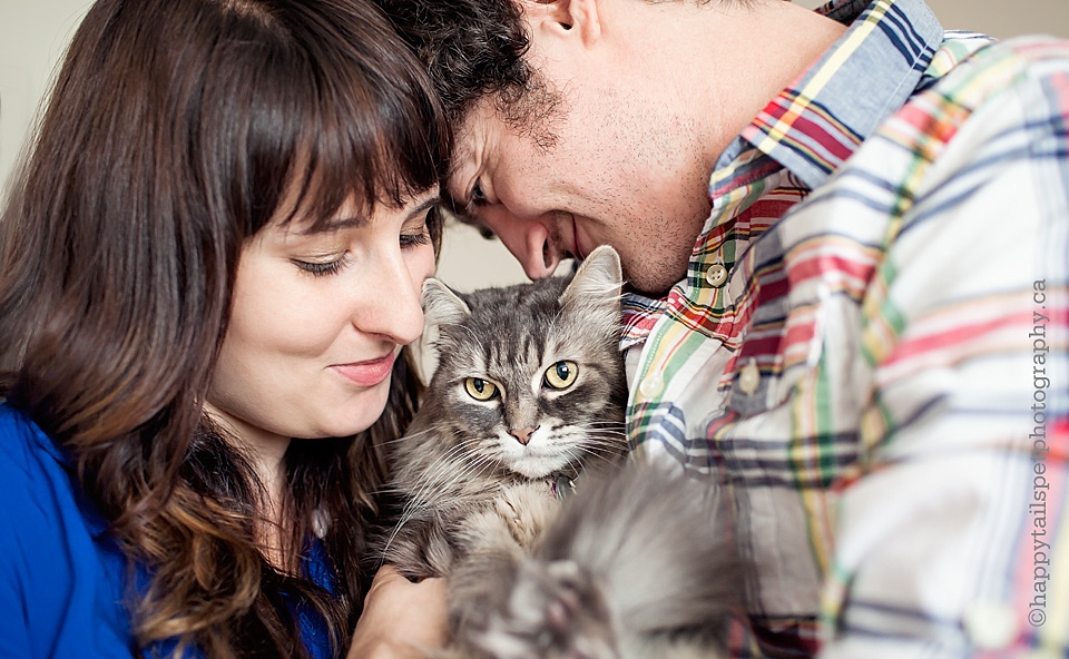 A couple show their love for their cat with cancer in Toronto apartment photo.
