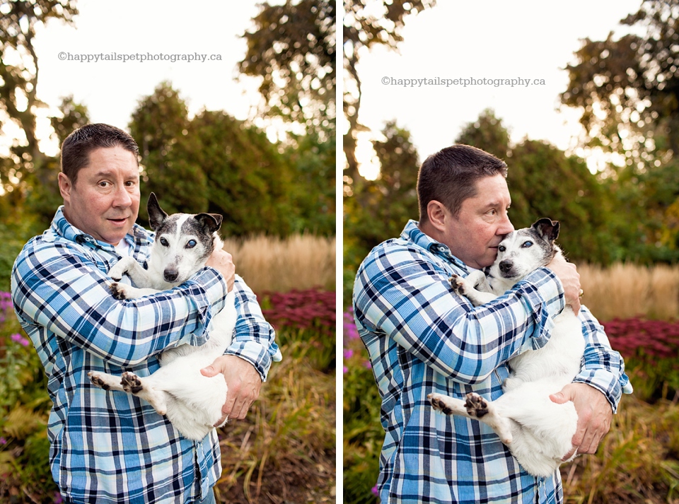 Man shows tenderness by kissing a dog in his arms, photo.