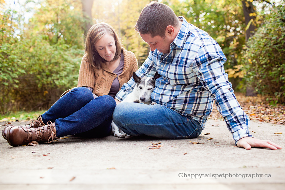 Natural outdoor pet photography of couple and their dog at Paletta Mansion in Burlington.