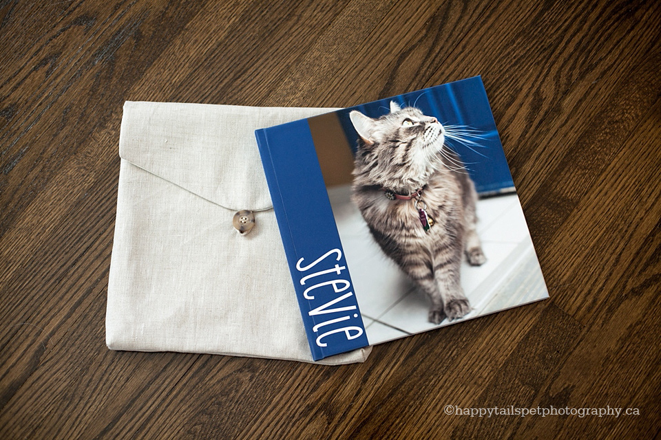 Cat photo book professionally designed by Toronto pet photographer photo.