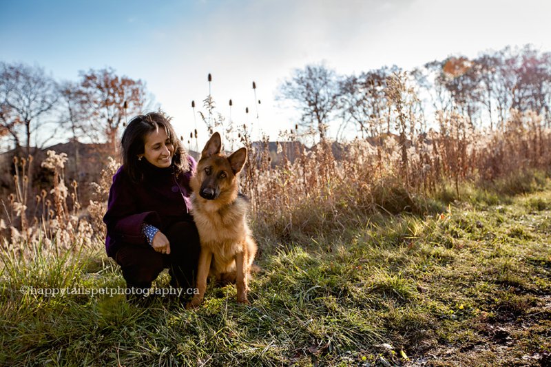 Woman and her german shepherd dog, candid, natural photography of people and their pets.