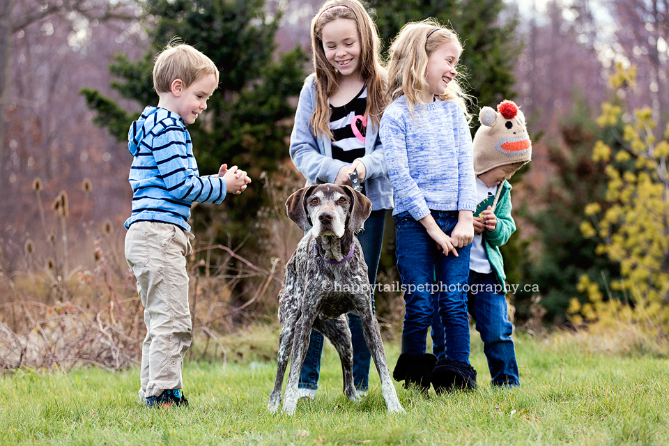 Burlington family photography with dog in natural outdoor location.